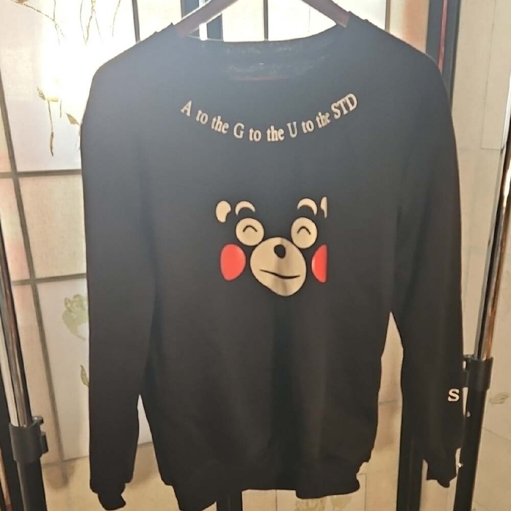 Black Crewneck Sweater with Playful Character Design